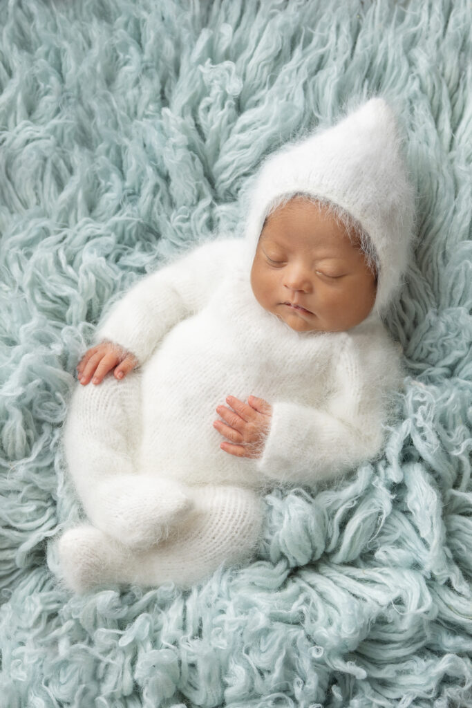 Sort hues newborn photo by Cincinnati newborn photographer Cream n Cocoa Photography, specializing in safe, baby-led posing and timeless portraits