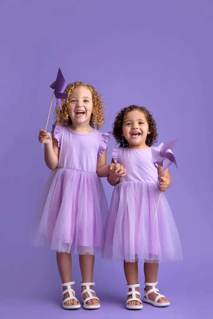purple theme sister portraits: Cincinnati and West Chester studio session