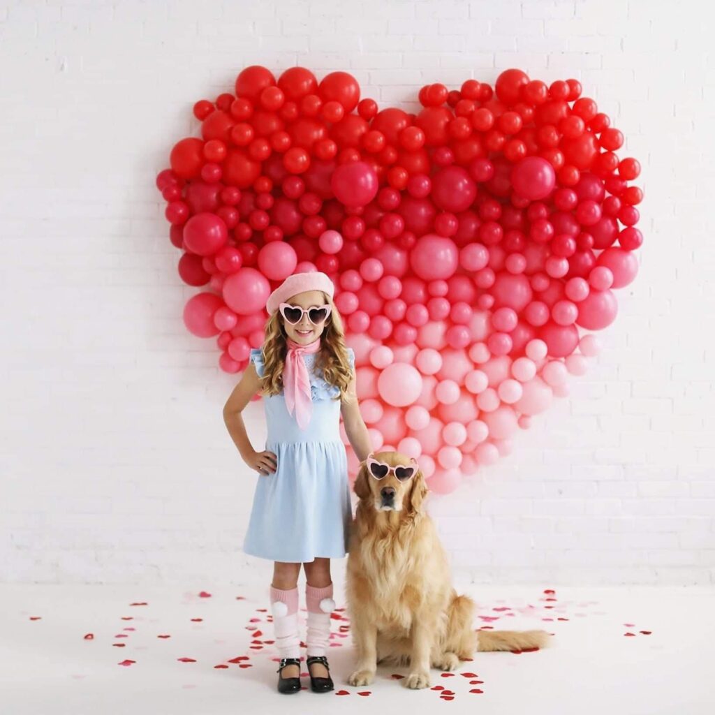 balloon heart image with the girl and dog – Cream N Cocoa Girl and family dog in heart backdrop during a Valentine’s themed portrait session.