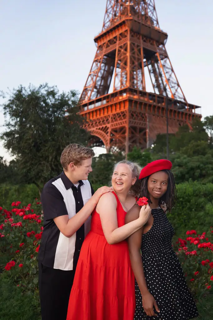 family photography session with children in front of the Eiffel Tower during a travel session